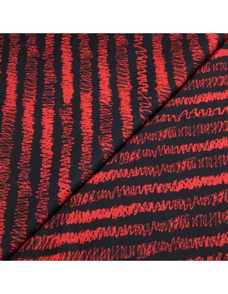 Molleton non gratté (French terry) - Rayure gribouilli rouge fond noir