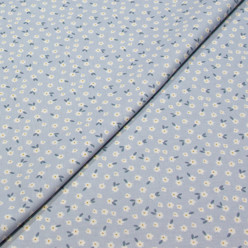 Popeline 100% coton - Petites fleurs sur fond bleu