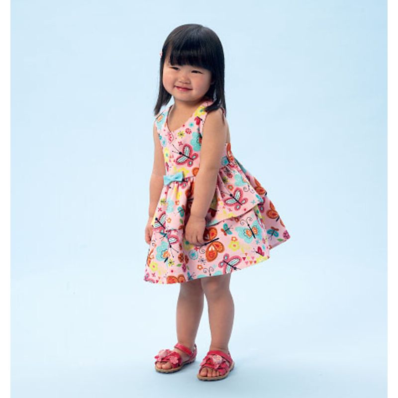 Patron McCall's 6944.CAA - Haut, robe, baboteuse et culotte