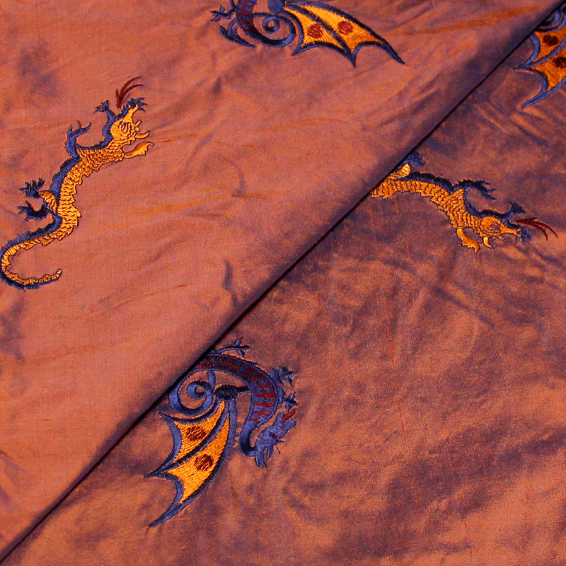 Soie sauvage 100% soie brodée - Dragon fond orange changeant bleu