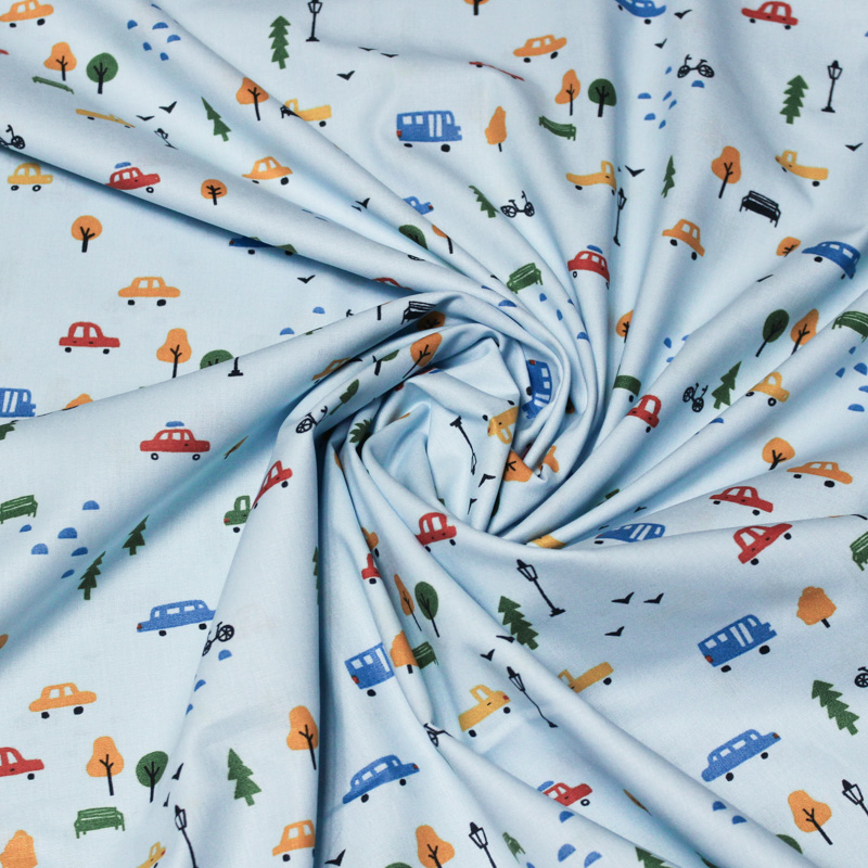 Popeline 100% coton - Ville fond bleu clair