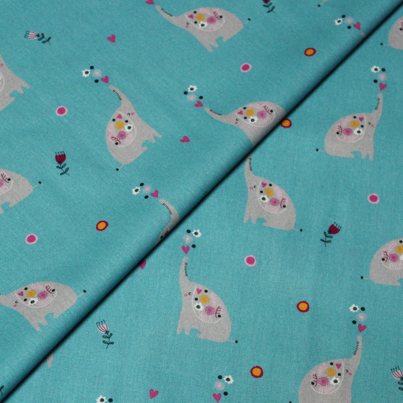 Popeline 100% coton - Motif elephant fond bleu