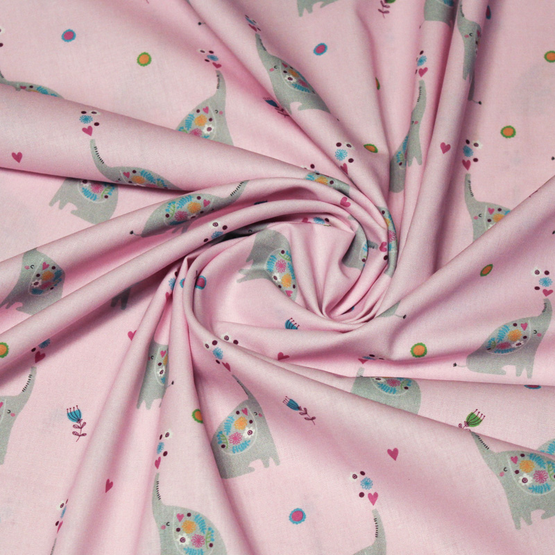 Popeline 100% coton - Motif elephant fond rose clair