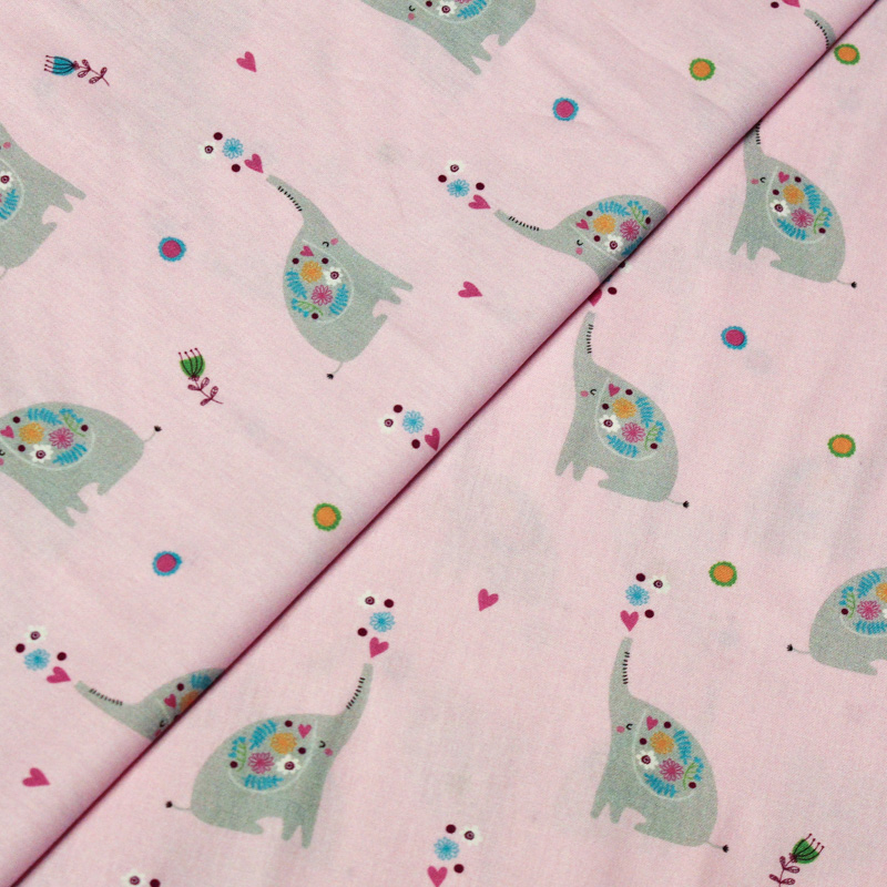 Popeline 100% coton - Motif elephant fond rose clair