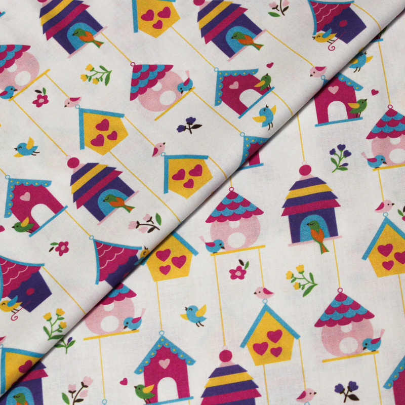 Popeline 100% coton - Motif maison d'oiseau coloré fond blanc