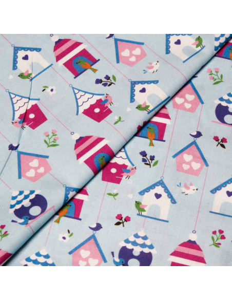Popeline 100% coton - Motif maison d'oiseau coloré fond bleu