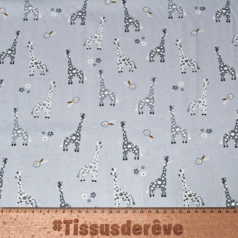 Popeline 100% coton - Motif girafe fond bleu charrette