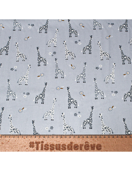 Popeline 100% coton - Motif girafe fond bleu charrette